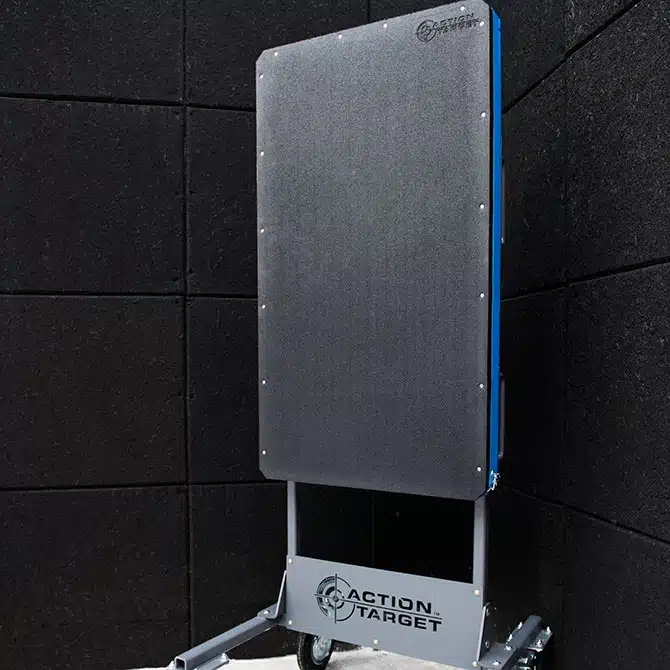 Mobile ballistic shield on wheels with Action Target logo in an indoor range