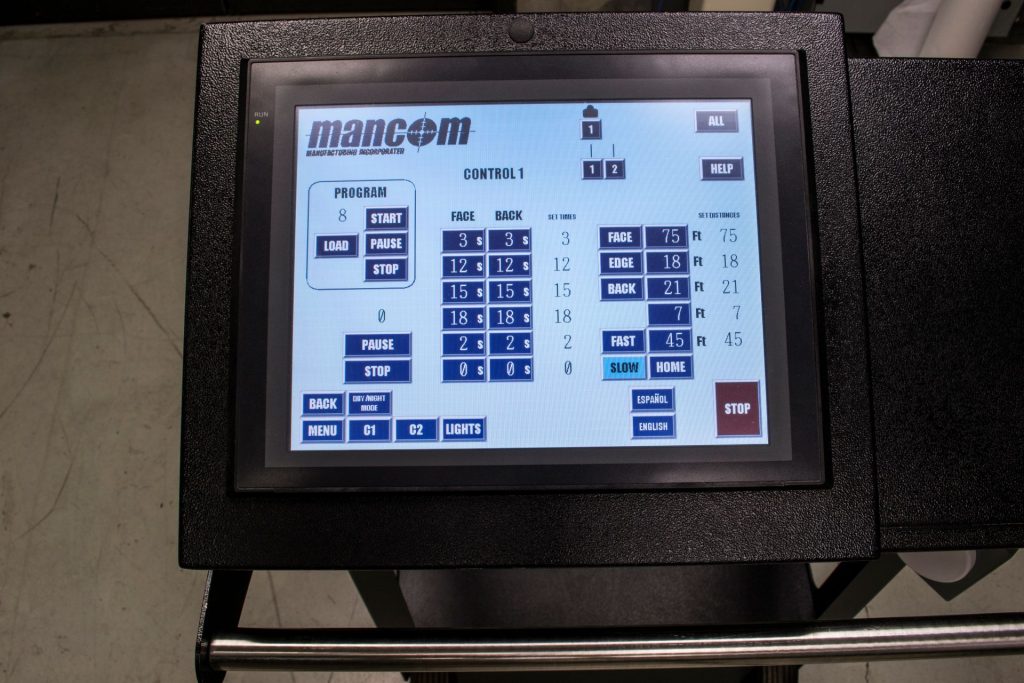Mancom Wireless Master Control screen on a cart