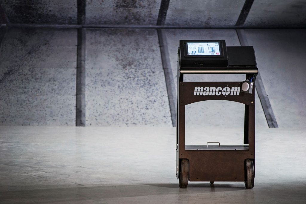 A Mancom Wireless Master Control Screen on a cart for downrange use