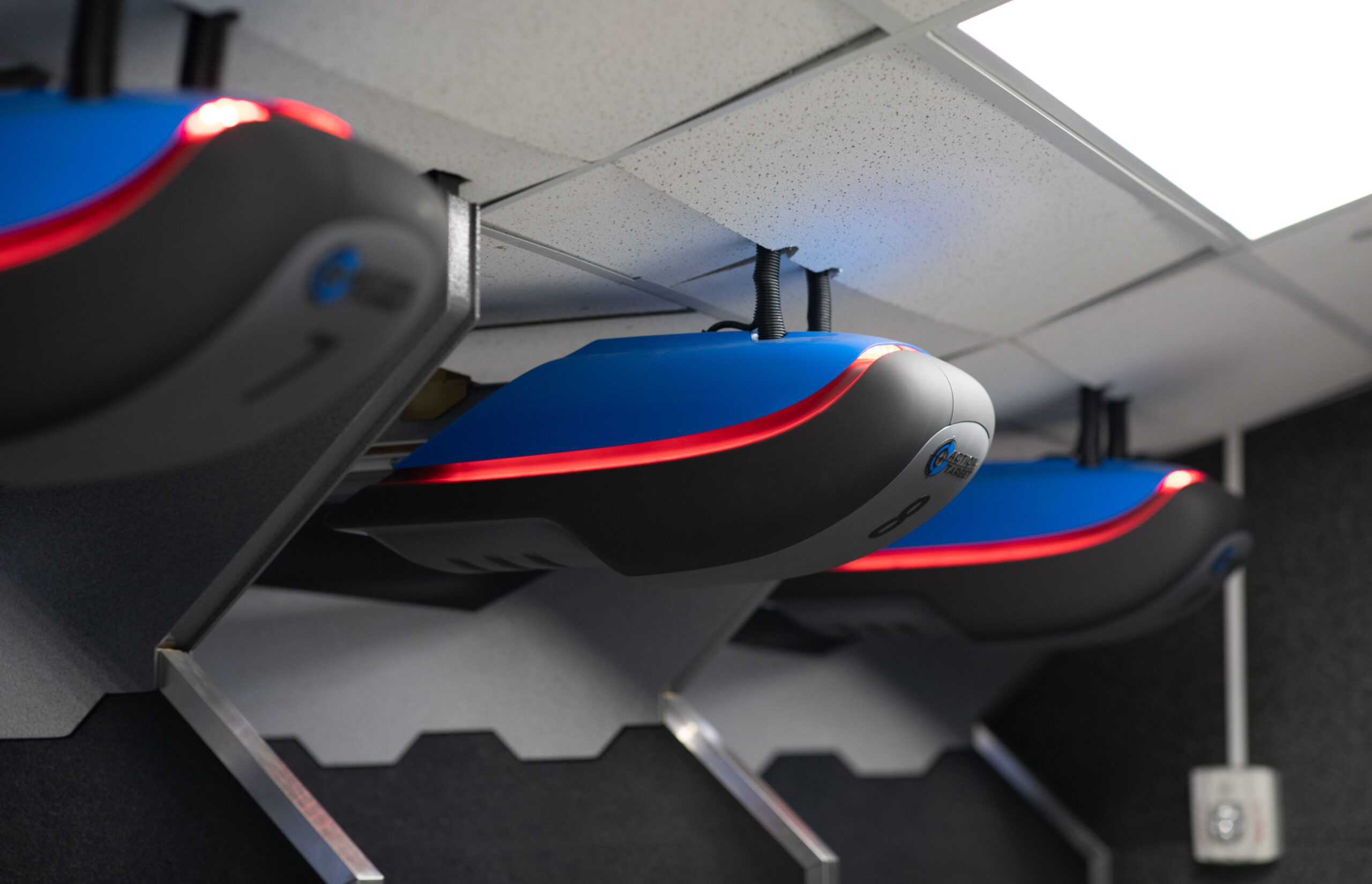 Three Action Target Genesis wireless target retrievers set up for three lanes.