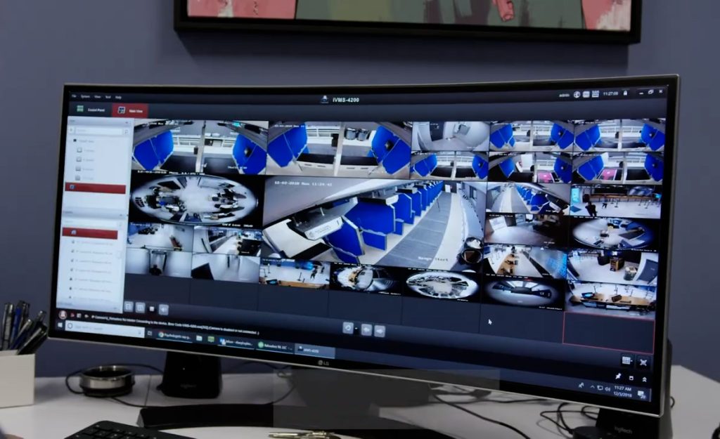 Security monitor displaying all rooms with security cameras