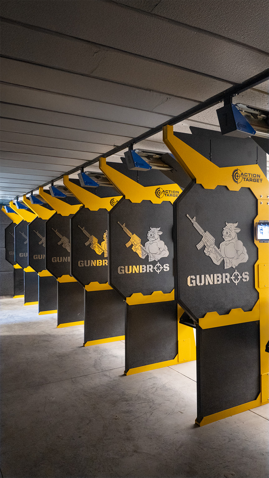 GunBros shooting range with custom Defender stalls