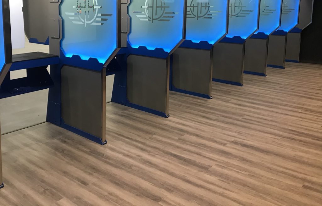 A commercial shooting range with faux wood flooring