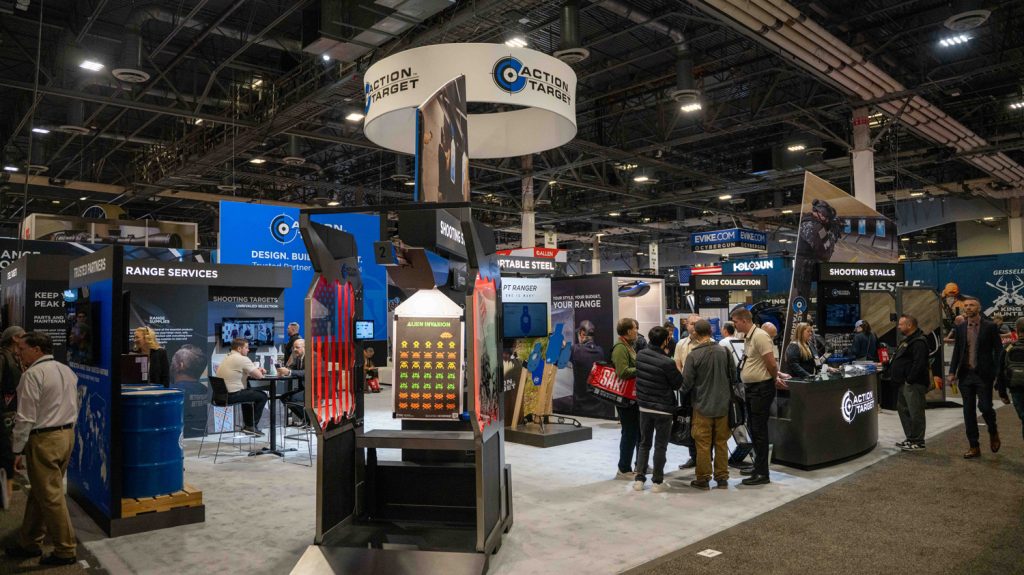 Action target shot show expo booth filled with people